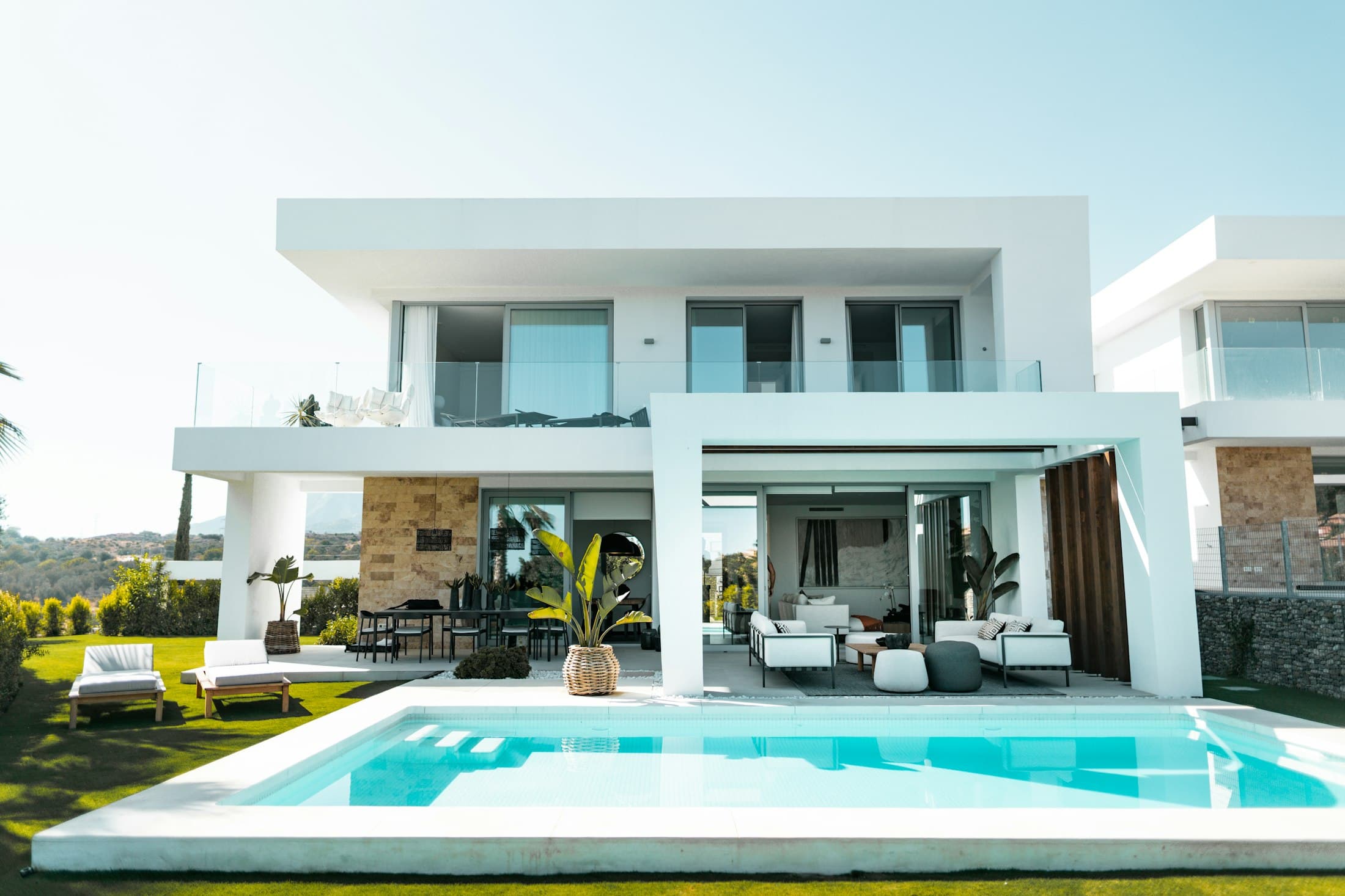 Modern villa with pool and outdoor lounge area