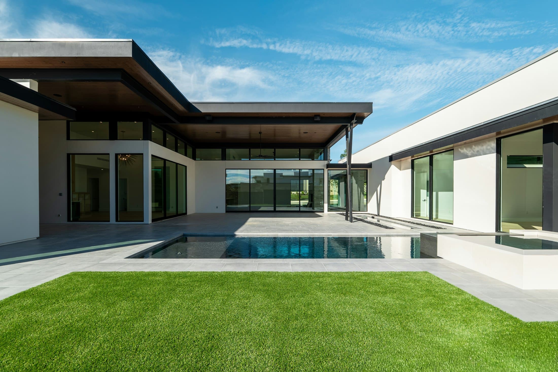 Modern residence with manicured landscaping