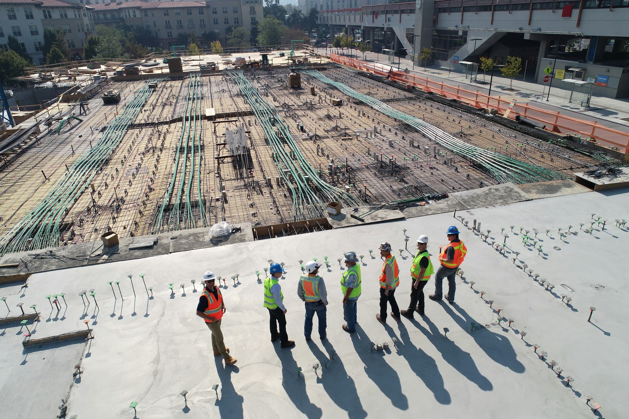 Construction crew standing together on site
